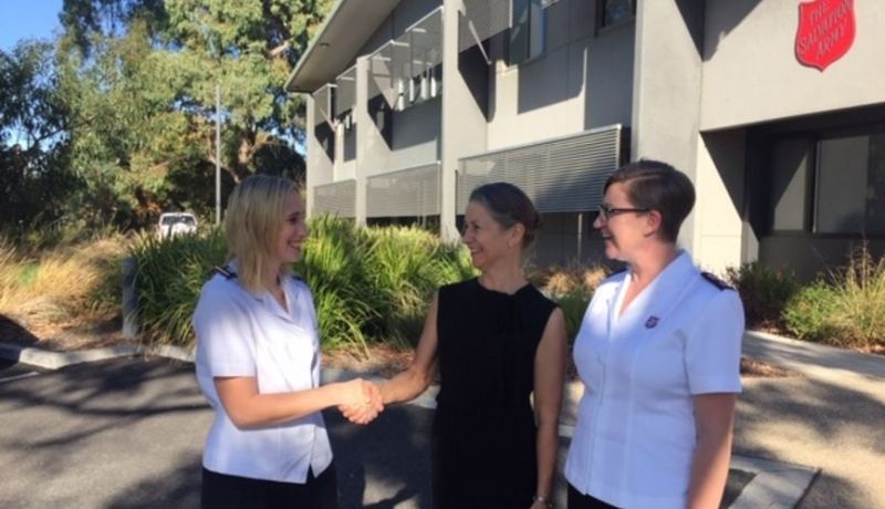 Caitlin Hallett is congratulated on her success in receiving the Eva Burrows Scholarship by Eva’s niece Ms Jane Southwell and Head of College Major Deborah Robinson.